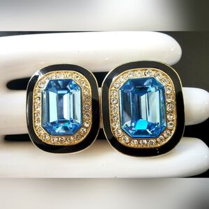 Vintage Sparkling Blue Faceted Crystal Rhinestone Black Enamel Clip on Earrings.
